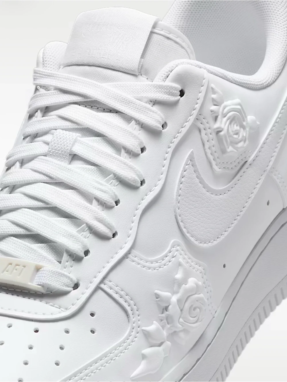 Nike Women’s White Embossed Rose Air Force 1 Sneakers
